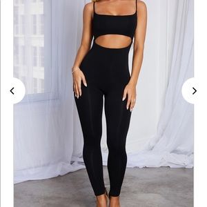 Brand new cut out jump suit M